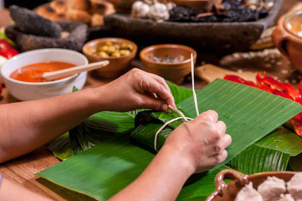 Wrapping tamales - a popular food in Guatemala