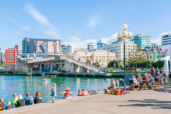 Wellington waterfront - weekend crowds relax on Wellington's inner city walkways. Credit: Hayden Bishop/TourismNewZealand